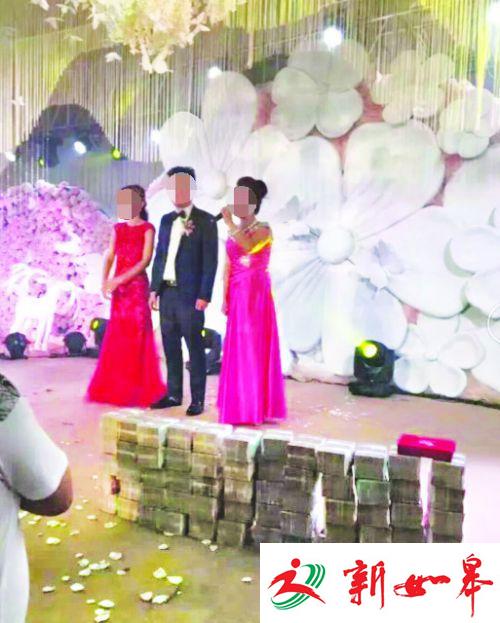 土豪给新娘600万见面礼 现金摞在婚礼现场-雉水网