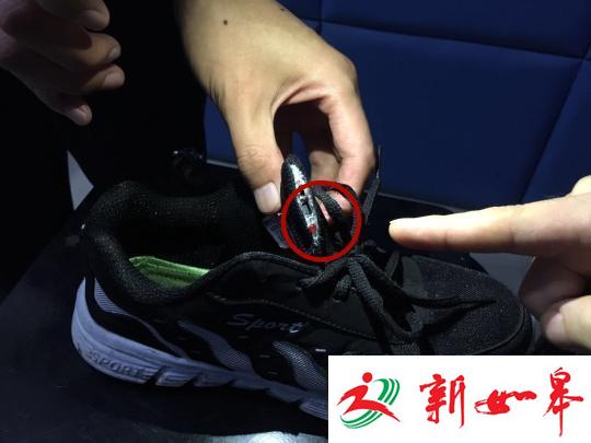 男子穿&ldquo;偷拍鞋&rdquo;闹市偷拍 被民警逮正着(图)